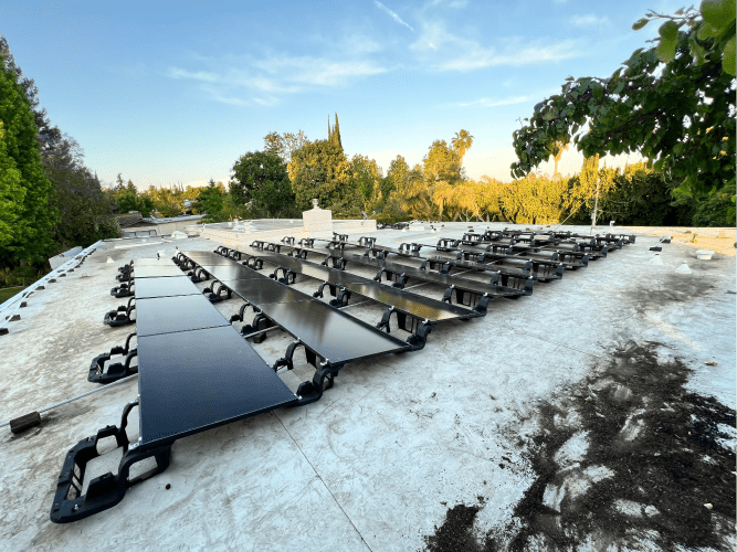 various solar panels on grey roof