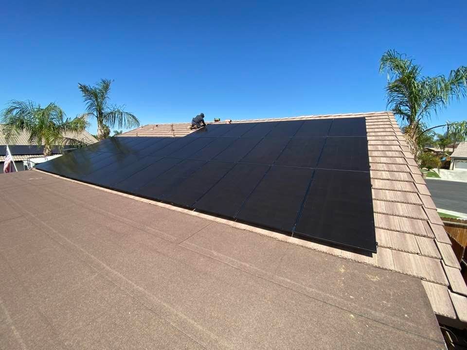 solar panels being installed on roof