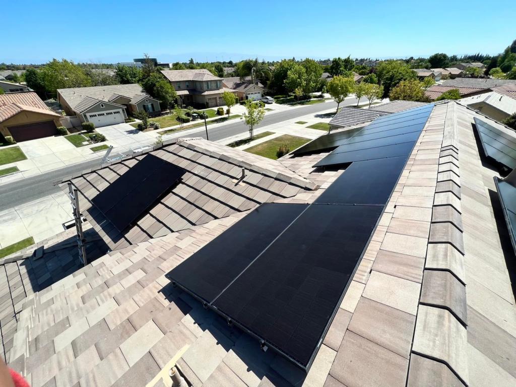 various black solar panels installed on roof in Bakersfield, CA